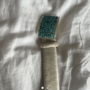 Genuine white cowhide with turquoise belt buckle